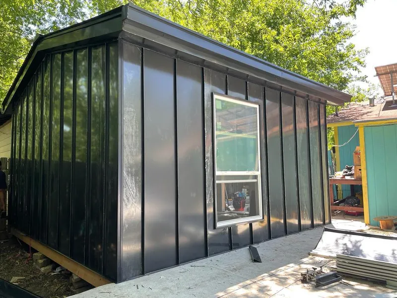 Black standing seam metal wall panels for Metal Roof Installation in Berryville