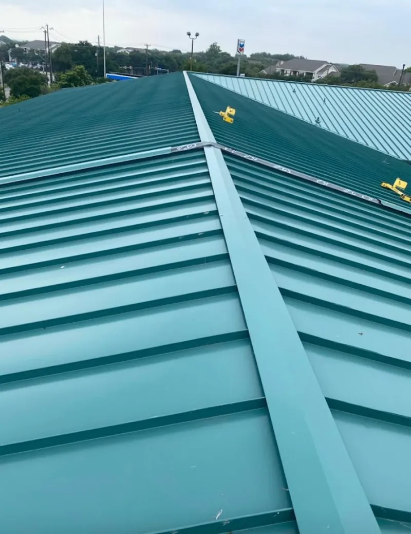 Green commercial metal roof ridge and valley for Metal Roof Repair in Berryville